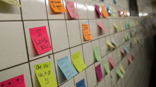NEW YORK, NY - NOVEMBER 10: Post-it notes, many with politically themed messages, hang on a wall at the 6th Avenue subway station as part of a public art project entitled 'Subway Therapy,' November 10, 2016 in New York City. Artist Matthew Chavez, who goes by 'Levee,' created the 'Subway Therapy' wall to offer New Yorkers a chance to write down their feelings in the wake of the presidential election. (Photo by Drew Angerer/Getty Images)